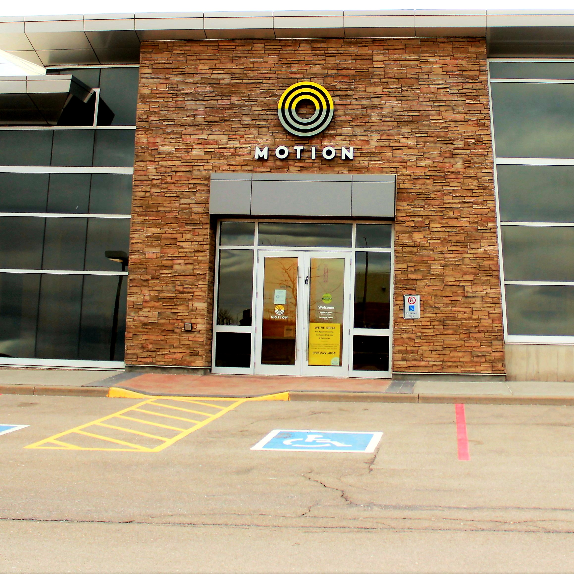 Hamilton storefront with accessible parking