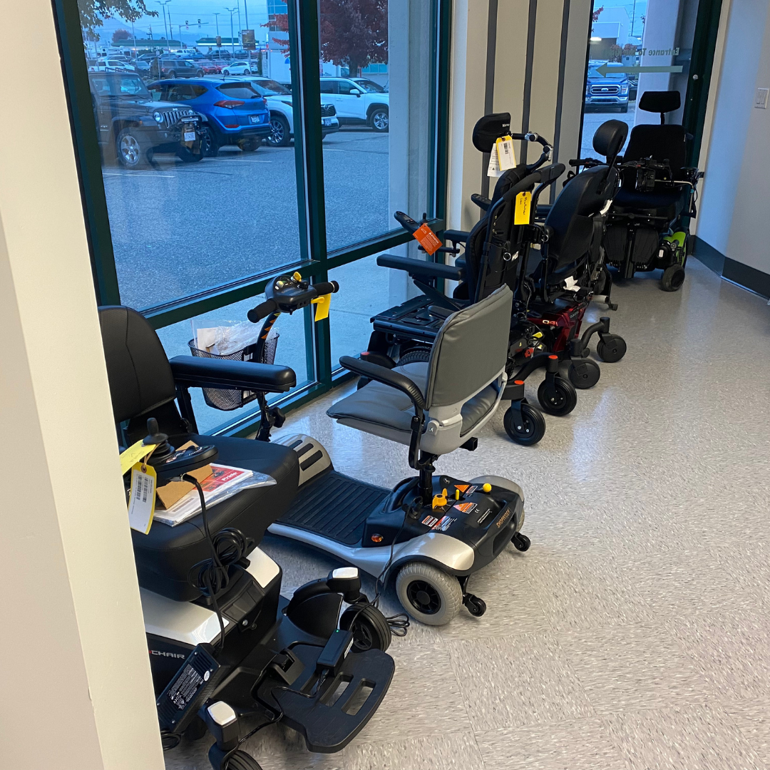 Line up of mobility equipment on interior side of front window.